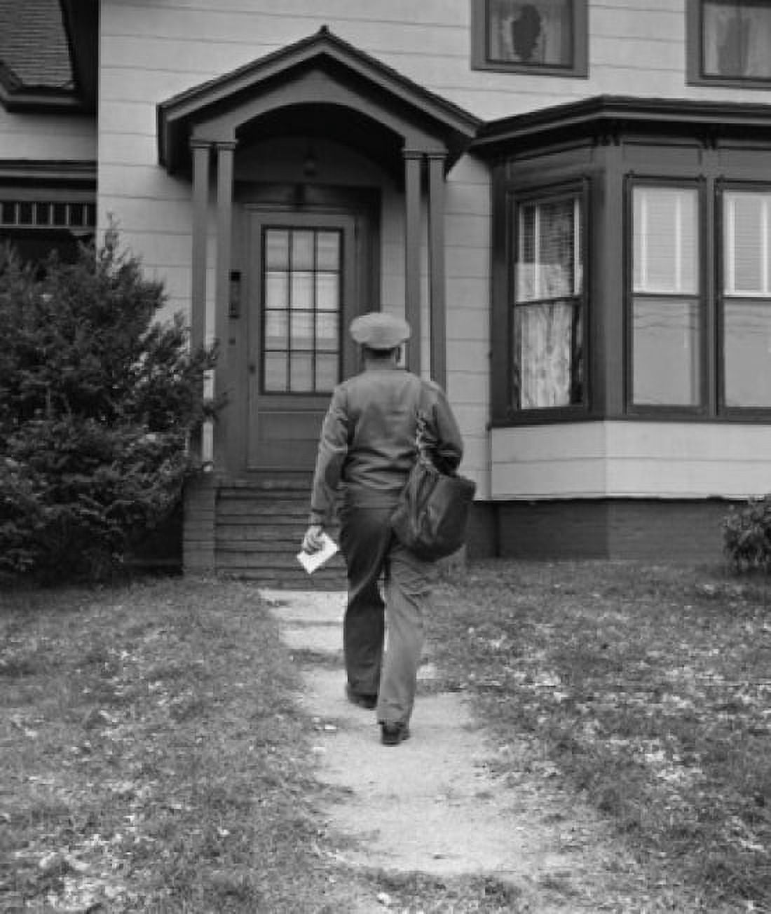 Rear view of a postman delivering mail Canvas Art - (18 x 24)