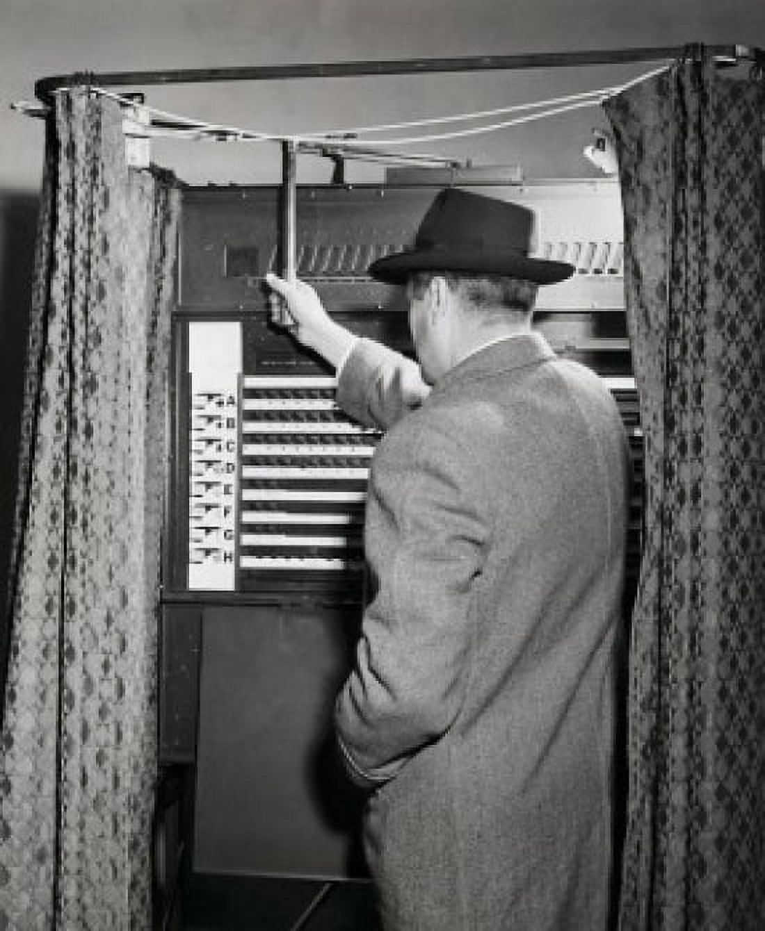 Rear view of a senior man standing in a voting booth Canvas Art - (18 x 24)
