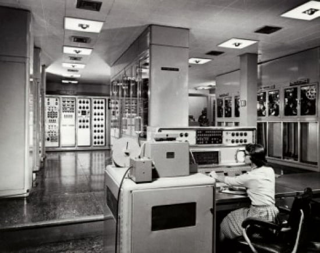 Rear view of a technician working on a computer Oracle Electronic Computer Atomic Energy Commission Tennessee USA Canvas Art -  (18 x 24)