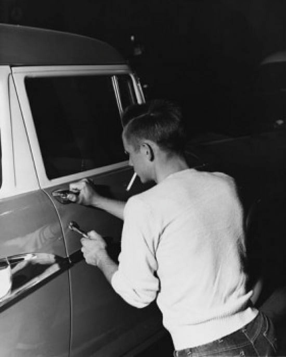 Rear view of a thief stealing a car Canvas Art -  (18 x 24)