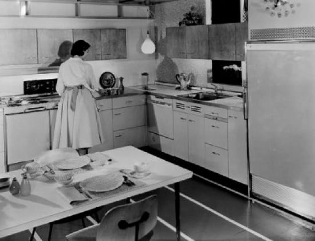 Rear view of a young woman preparing food in a kitchen Canvas Art - (18 x 24)