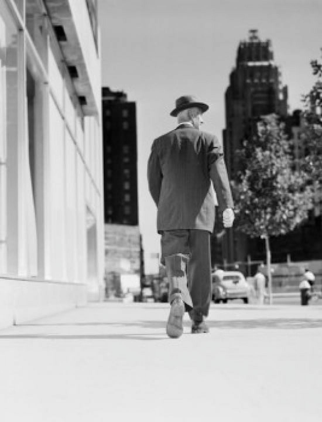 Rear view of businessman walking in downtown Canvas Art - (18 x 24)