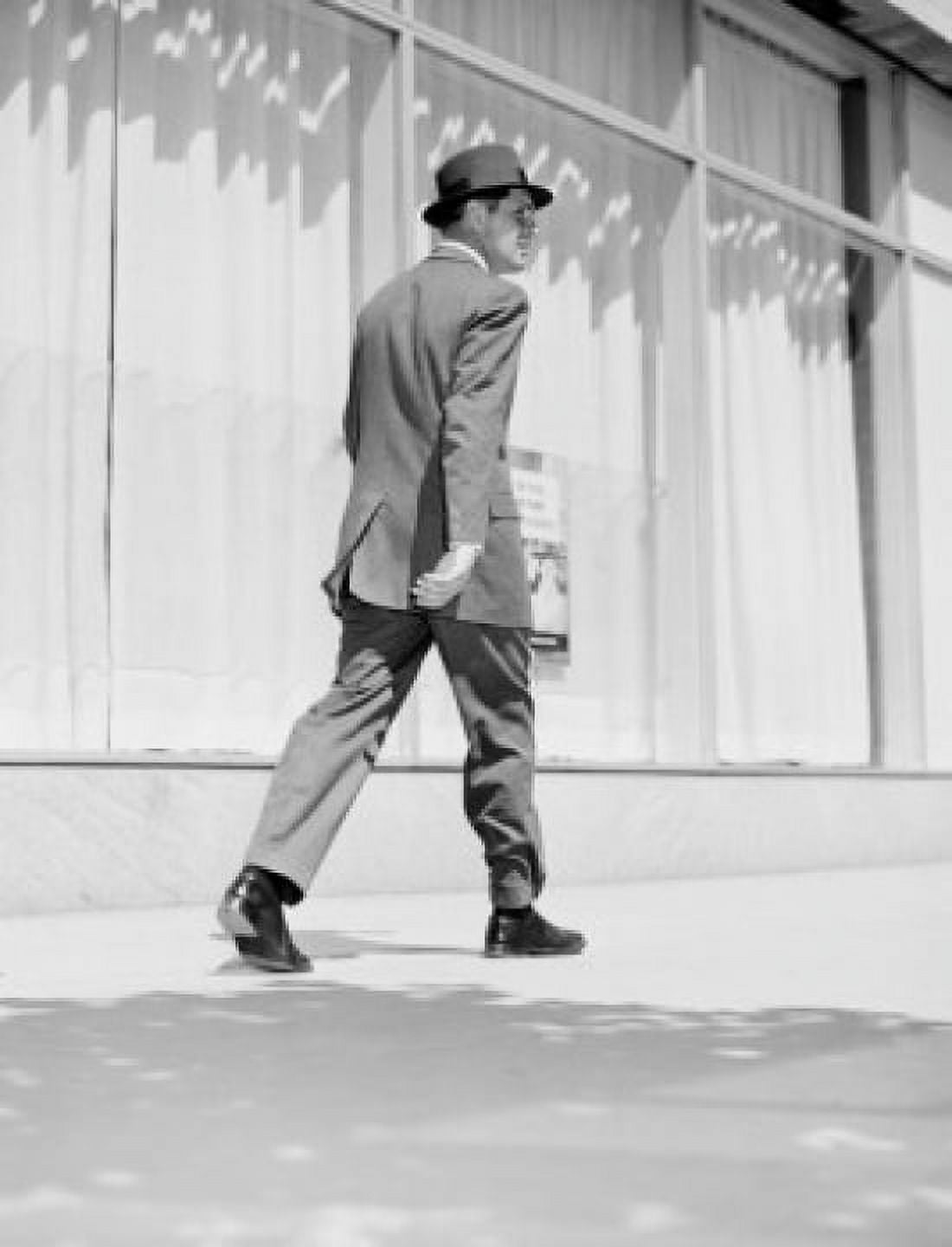 Rear view of businessman walking in downtown Canvas Art - (24 x 36)