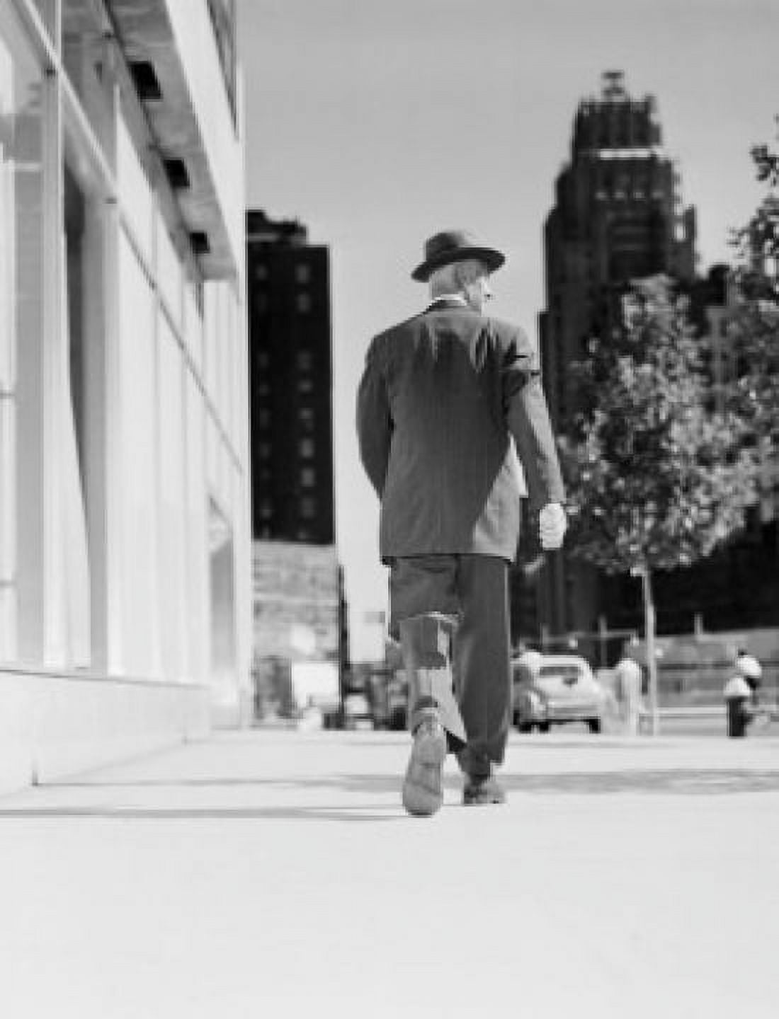 Rear view of businessman walking in downtown Canvas Art - (24 x 36)