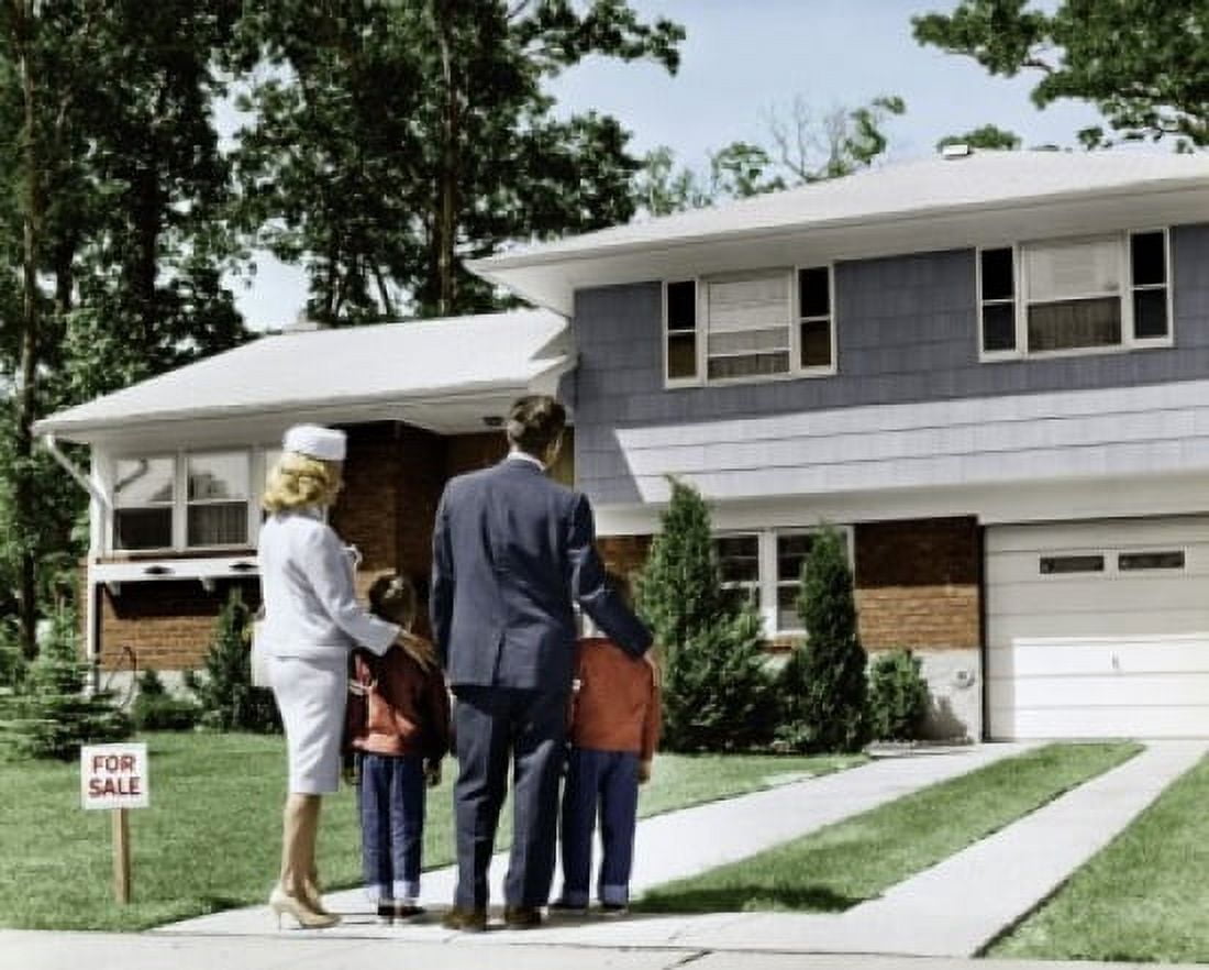 Rear view of parents standing with their two children in front of a house Canvas Art - (18 x 24)