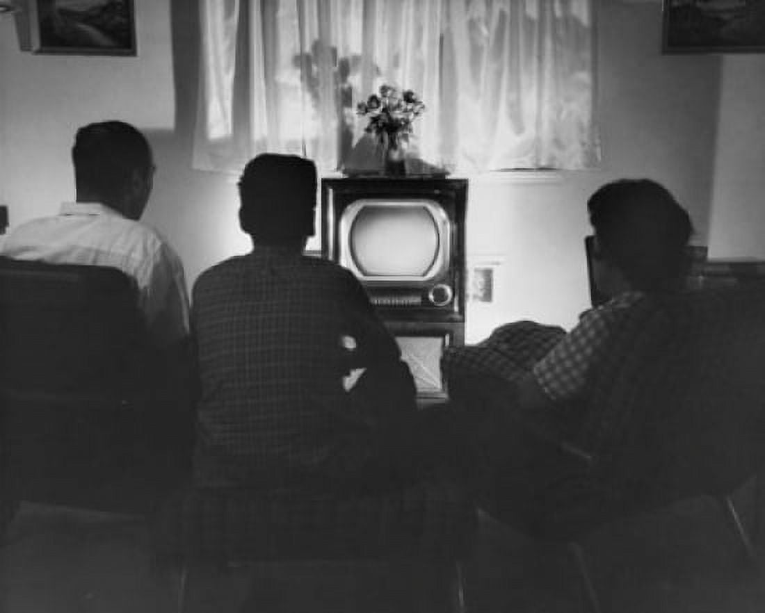 Rear view of parents with their son sitting in front of a television Canvas Art - (18 x 24)