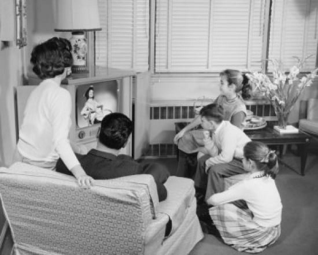 Rear view of parents with their three children watching television Canvas Art - (18 x 24)
