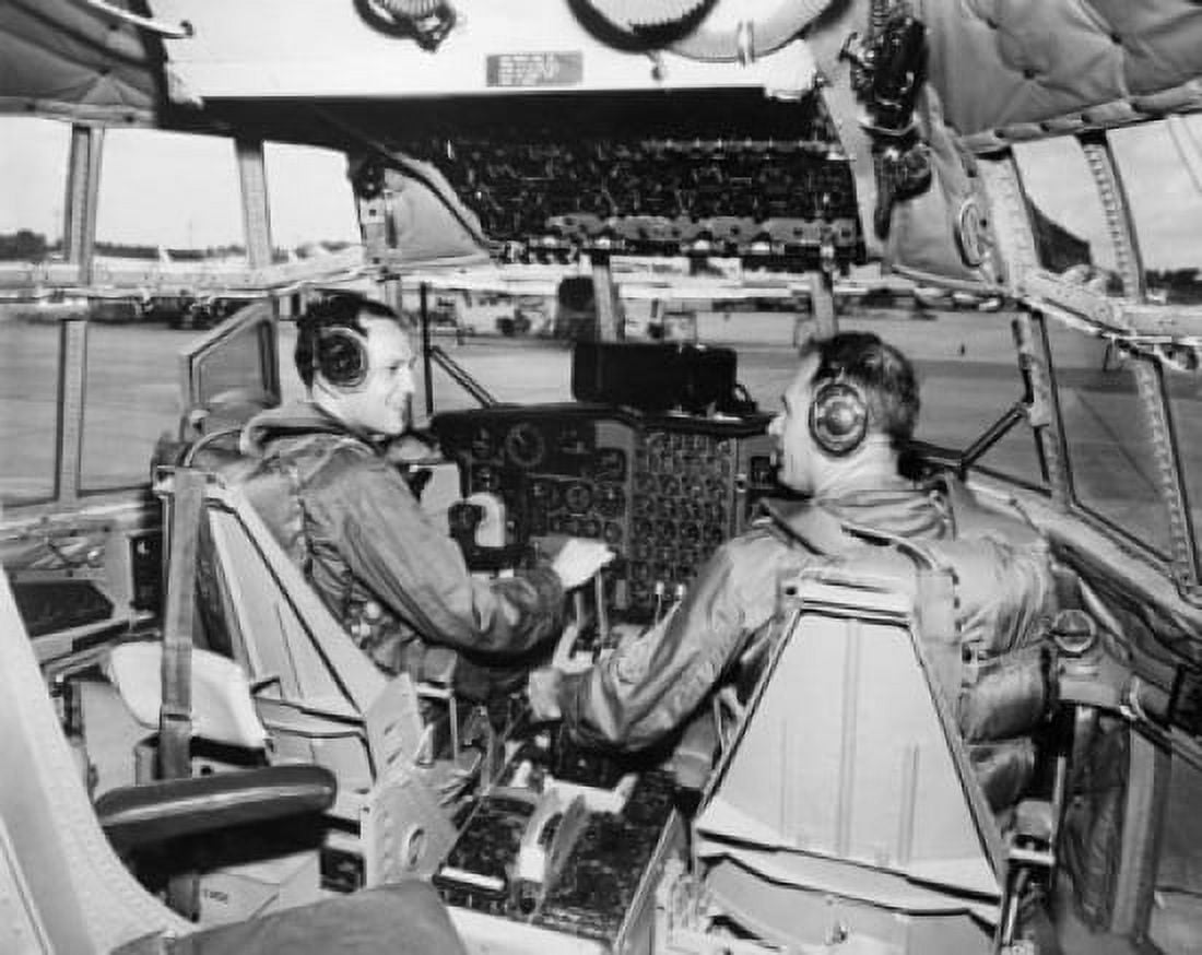 Rear view of two US Air Force pilots sitting in the cockpit of an aircraft Canvas Art - (24 x 36)