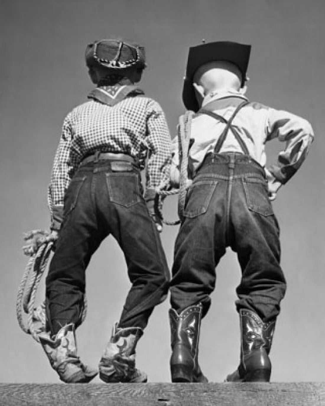 Rear view of two boys in cowboy costumes Canvas Art - (18 x 24)