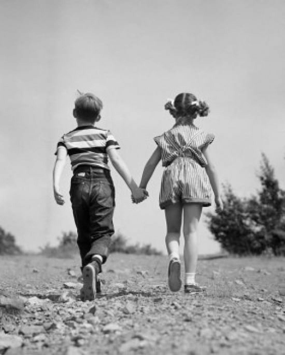 Rear view of two children walking and holding hands Canvas Art - (18 x 24)
