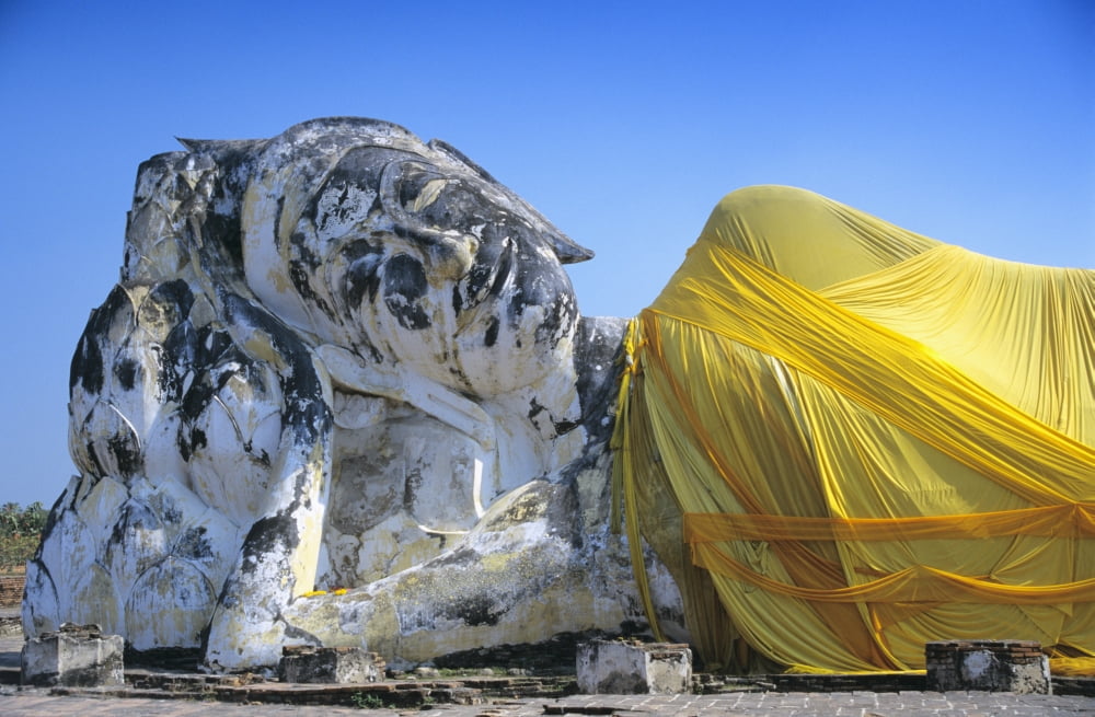 Reclining Budda statue wrapped with yellow cloth Canvas Art - Richard Maschmeyer Design Pics (18 x 11)