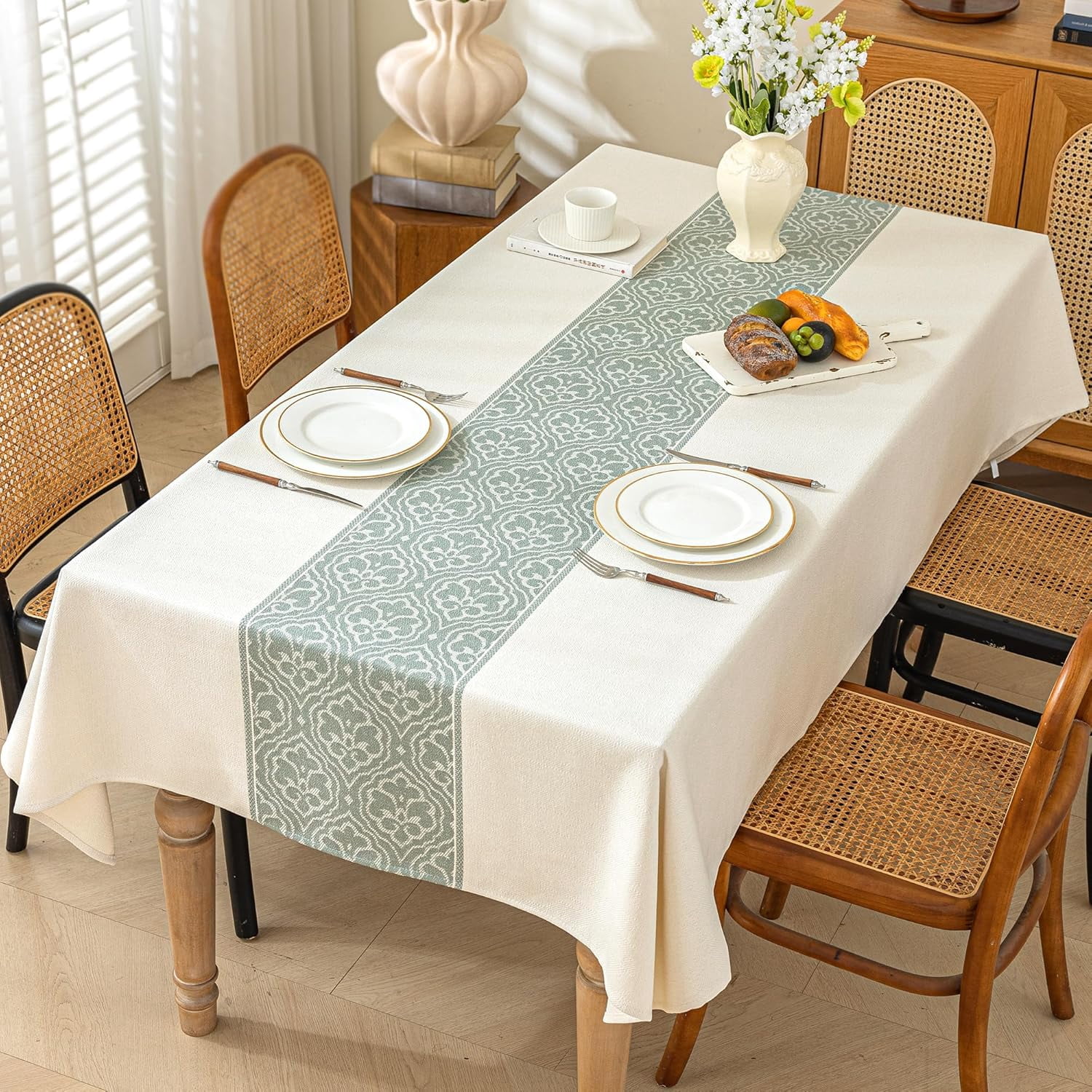 Rectangular dining table with linen tablecloth, used in restaurants and ...