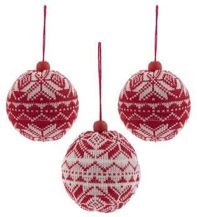 22 a traditional Nordic Christmas tree with white, red and silver ornaments  and c…