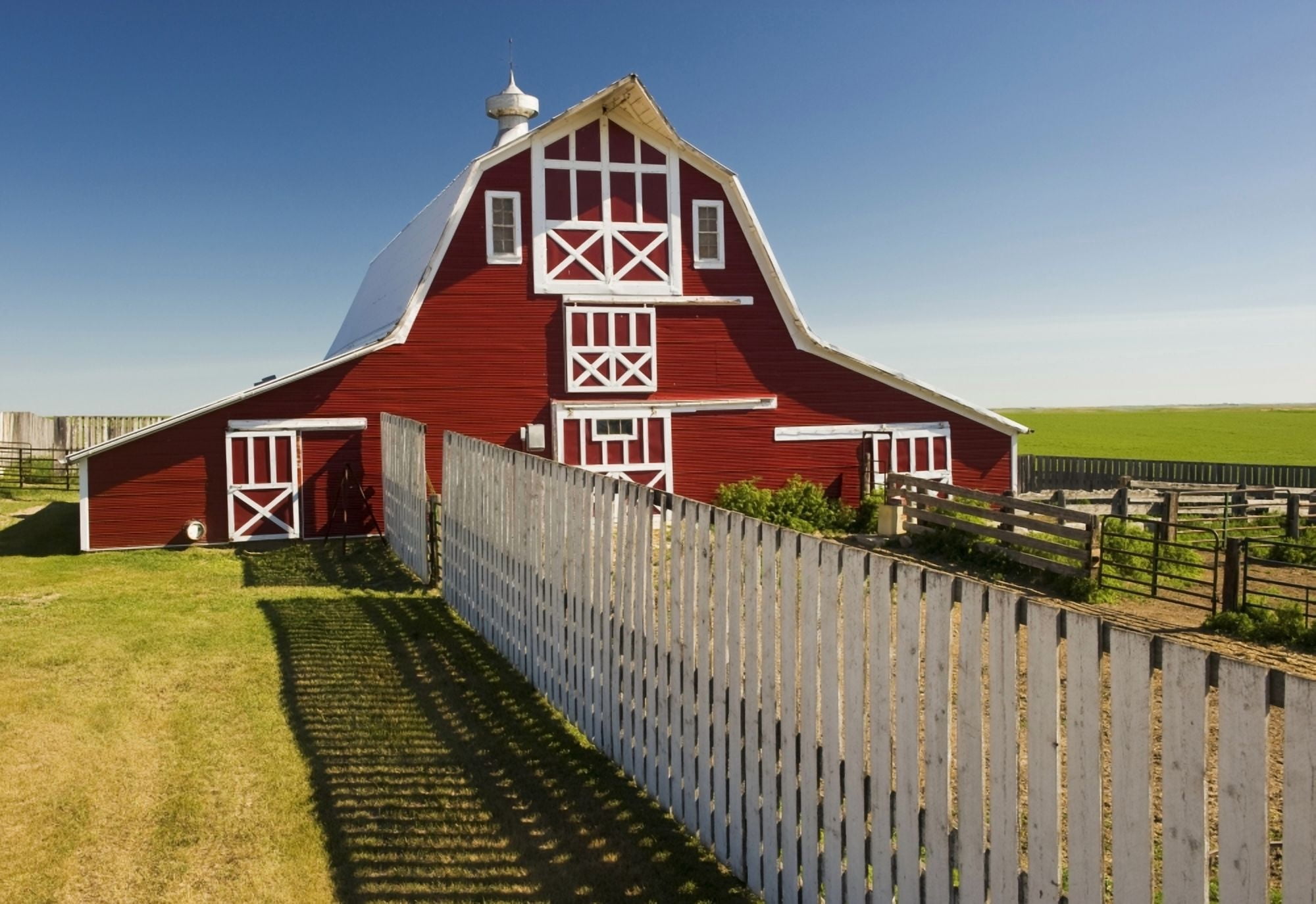 Red Barn With Fence Near Lake Alma Saskatchewan Canvas Art - Dave Reede Design Pics (17 x 12)