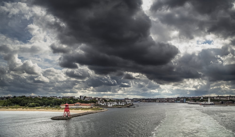 Red Herd Groyne lighthouse at the end of a pier under storm clouds South Shields Tyne and Wear England Canvas Art - John Short Design Pics (40 x 22)