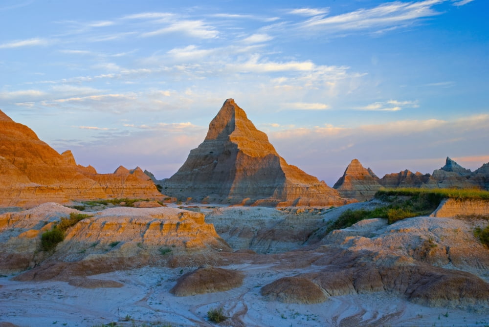 A Red Sunrise Illuminates The Hills In Badlands National Park South Dakota United States Of America Canvas Art - Philippe Widling Design Pics (19 x 12)