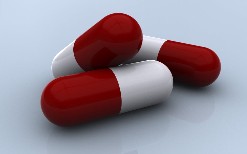 Red and yellow medication capsules Canvas Art - Stocktrek Images (18 x 12)