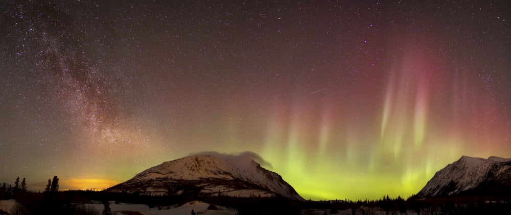 Red aurora borealis and Milky Way over Carcross Desert Canada Canvas Art - Joseph BradleyStocktrek Images (43 x 19)