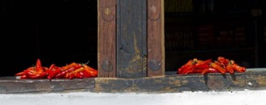 Red chilies drying on window sill Paro Bhutan Canvas Art - Panoramic Images (30 x 12)