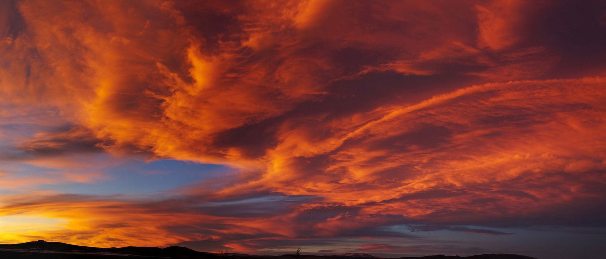 Red dramatic sky during sunset Taos Taos County New Mexico USA Canvas Art - Panoramic Images (27 x 9)