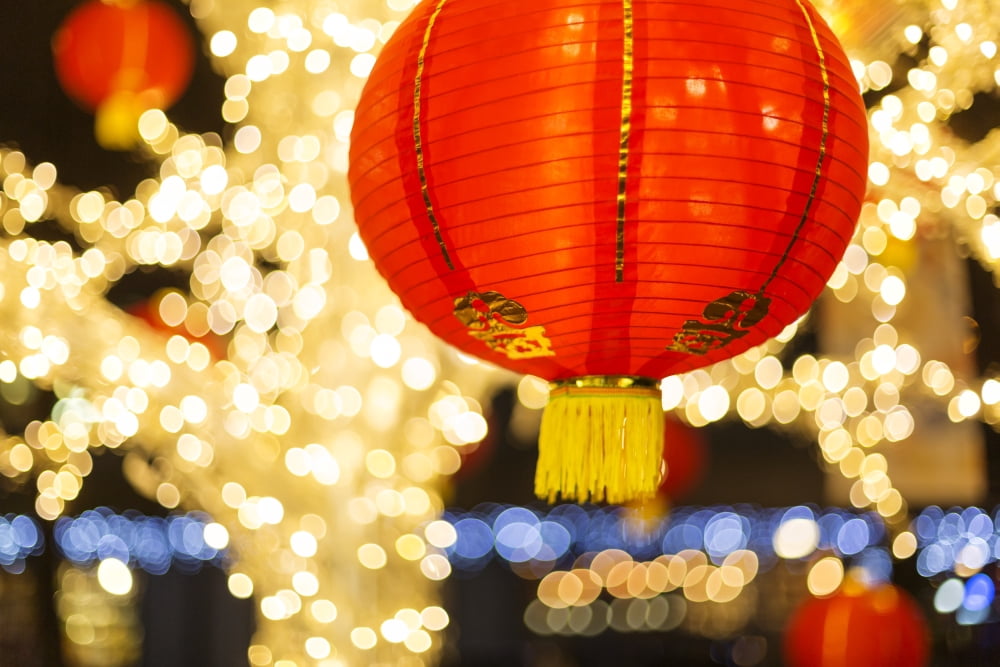 Red and gold Chinese lantern with sparkling white lights in the background Granville Island Vancouver British Columbia Canada Canvas Art - Lorna Rande Design Pics (38 x 24)