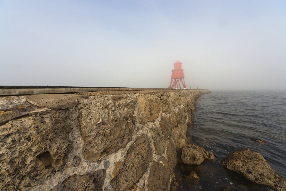 Red lighthouse in the fog on the coastSouth shields tyne and wear england Canvas Art - John Short Design Pics (38 x 24)