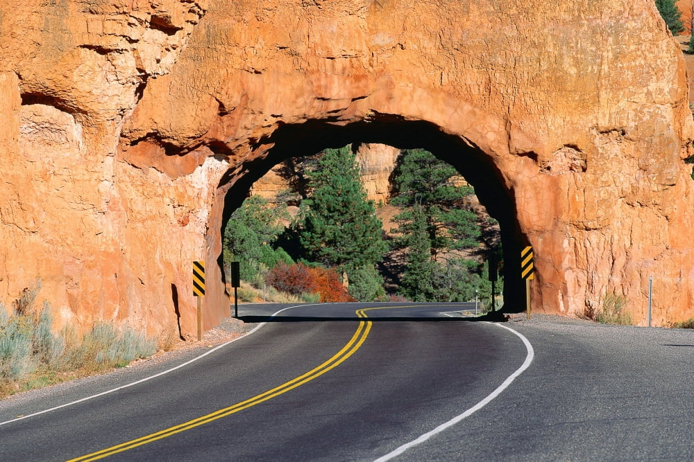 Red rock tunnel on highway Canvas Art - Panoramic Images (24 x 36)