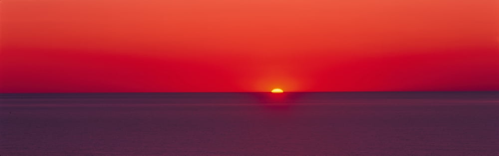 Red sunrise of Lake Michigan Canvas Art - Panoramic Images (36 x 12)