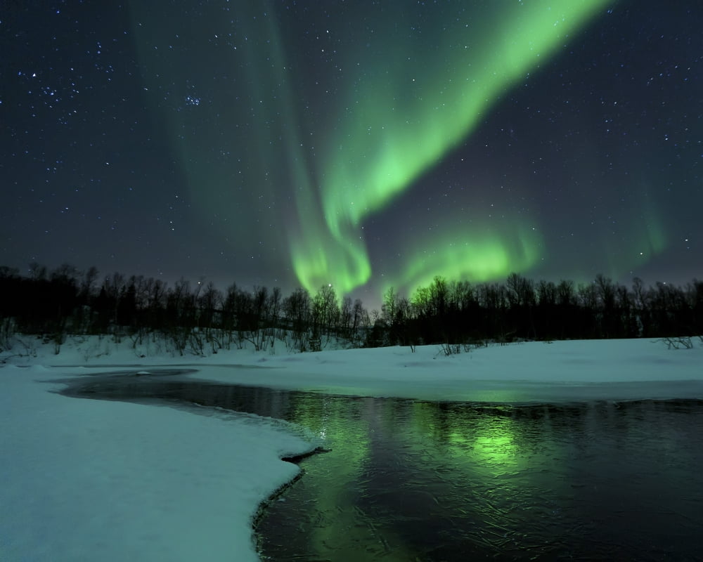 Reflected aurora over a frozen Laksa Lake Nordland Norway Canvas Art - Arild HeitmannStocktrek Images (16 x 13)