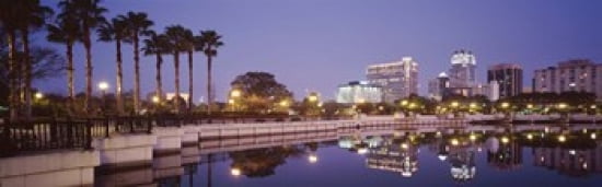 Reflection Of Buildings In The Lake Lake Luceme Orlando Florida USA Canvas Art - Panoramic Images (36 x 12)