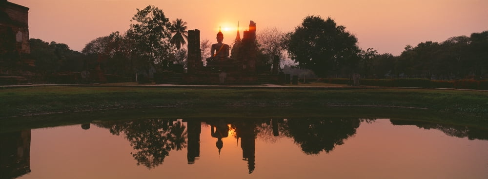 Reflection of Buddha statue on water Sukhothai Historical Park Sukhothai Thailand Canvas Art - Panoramic Images (36 x 12)