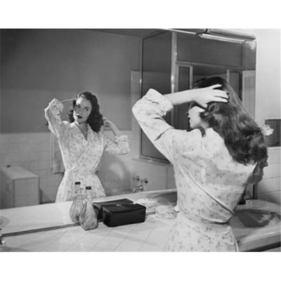 Reflection of Young Woman Brushing Her Hair in Mirror Poster Print - 18 x 24 in.