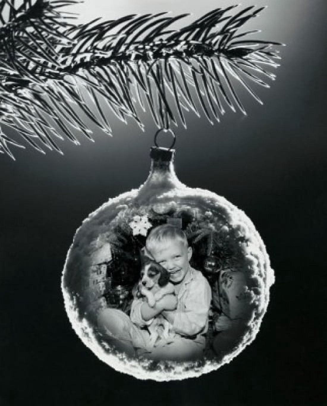 Reflection of a boy with a puppy in a Christmas ornament Canvas Art - (18 x 24)