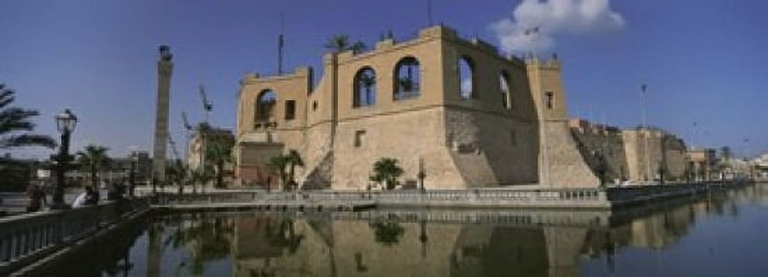 Reflection of a building in a pond Assai Al-Hamra Tripoli Libya Canvas Art - Panoramic Images (18 x 7)