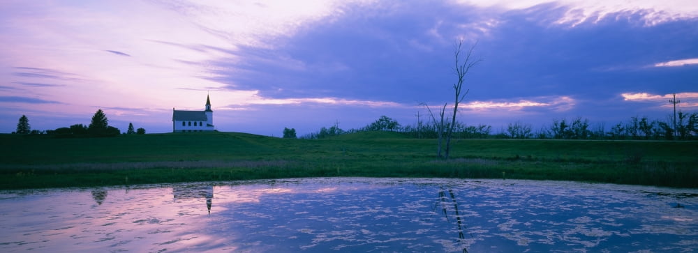 Reflection of a church near a pond North Dakota USA Canvas Art - Panoramic Images (36 x 12)