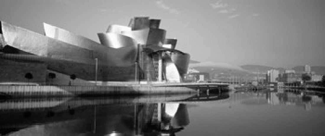 Reflection of a museum on water Guggenheim Musuem Bilbao Spain Canvas Art - Panoramic Images (30 x 13)