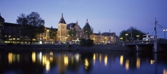 Reflection of a railway station in water Amsterdam Central Station Amsterdam Netherlands Canvas Art - Panoramic Images (30 x 14)
