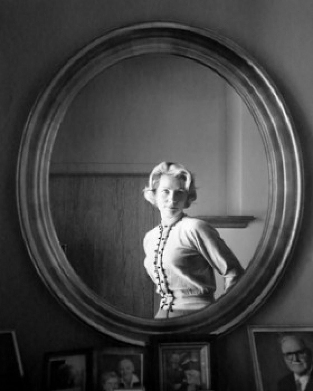 Reflection of a young woman in a mirror Canvas Art - (24 x 36)