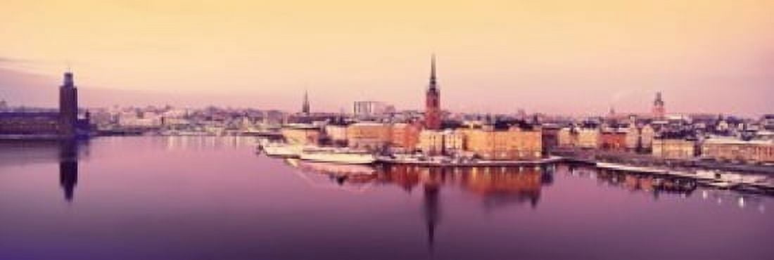 Reflection of buildings in a lake Lake Malaren Riddarholmen Gamla Stan Stockholm Sweden Canvas Art - Panoramic Images (18 x 6)