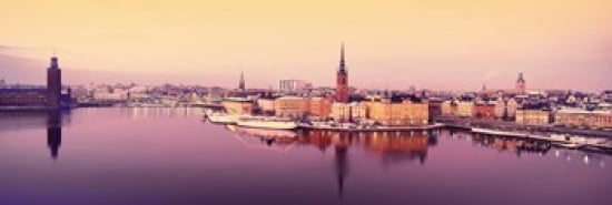 Reflection of buildings in a lake Lake Malaren Riddarholmen Gamla Stan Stockholm Sweden Canvas Art - Panoramic Images (36 x 12)