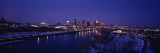 Reflection of buildings in a river at night Mississippi River Minneapolis and St Paul Minnesota USA Canvas Art - Panoramic Images (36 x 12)