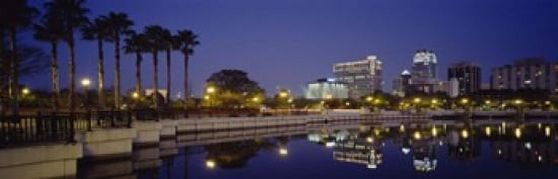 Reflection of buildings in water Orlando Florida USA Canvas Art - Panoramic Images (18 x 6)