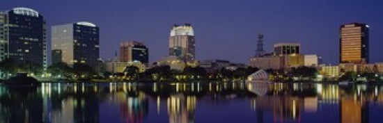 Reflection of buildings in water Orlando Florida USA Canvas Art - Panoramic Images (36 x 12)