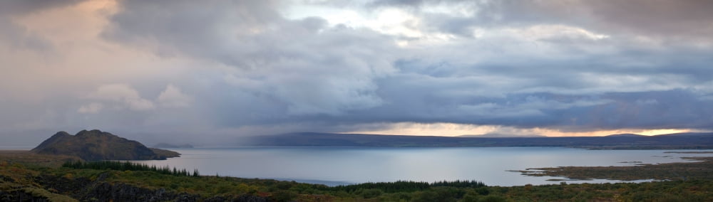 Reflection of clouds in a lake Lake Pingvallavatn Thingvellir National Park Iceland Canvas Art - Panoramic Images (36 x 12)