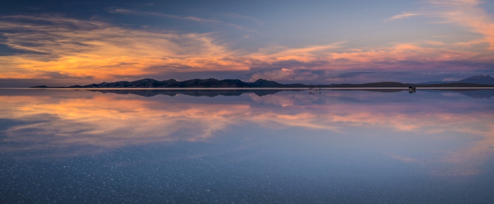 Reflection of clouds in a lake at sunset Salar de Uyuni Altiplano Bolivia Canvas Art - Panoramic Images (36 x 12)
