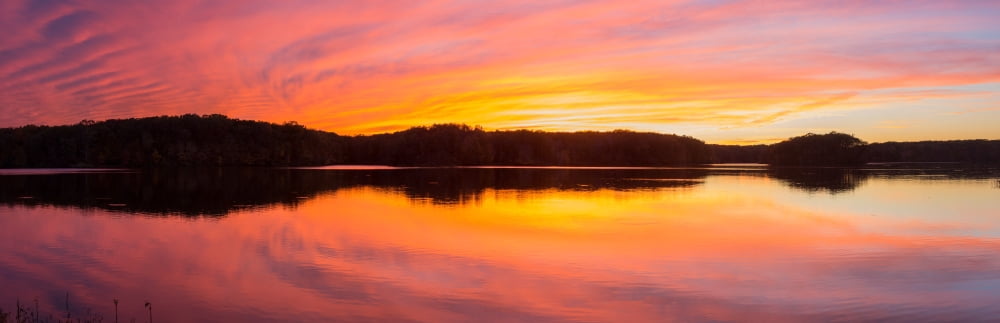 Reflection of clouds in a lake at sunset Stephen A Forbes State Recreation Area Marion County Illinois USA Canvas Art - Panoramic Images (12 x 36)