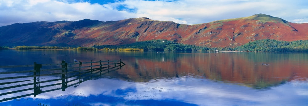 Reflection of clouds on water Derwentwater Lake District Lake District National Park England Canvas Art - Panoramic Images (36 x 12)