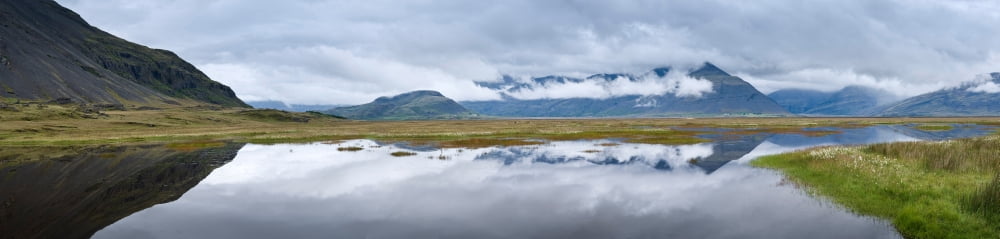 Reflection of clouds on water Vatnajokull National Park Iceland Canvas Art - Panoramic Images (27 x 9)
