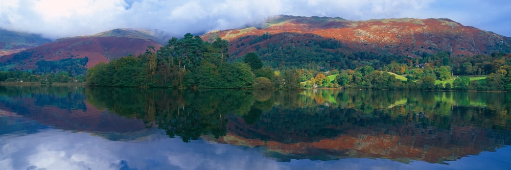 Reflection of hills in a lake Grasmere Lake District Lake District National Park England Canvas Art - Panoramic Images (36 x 12)