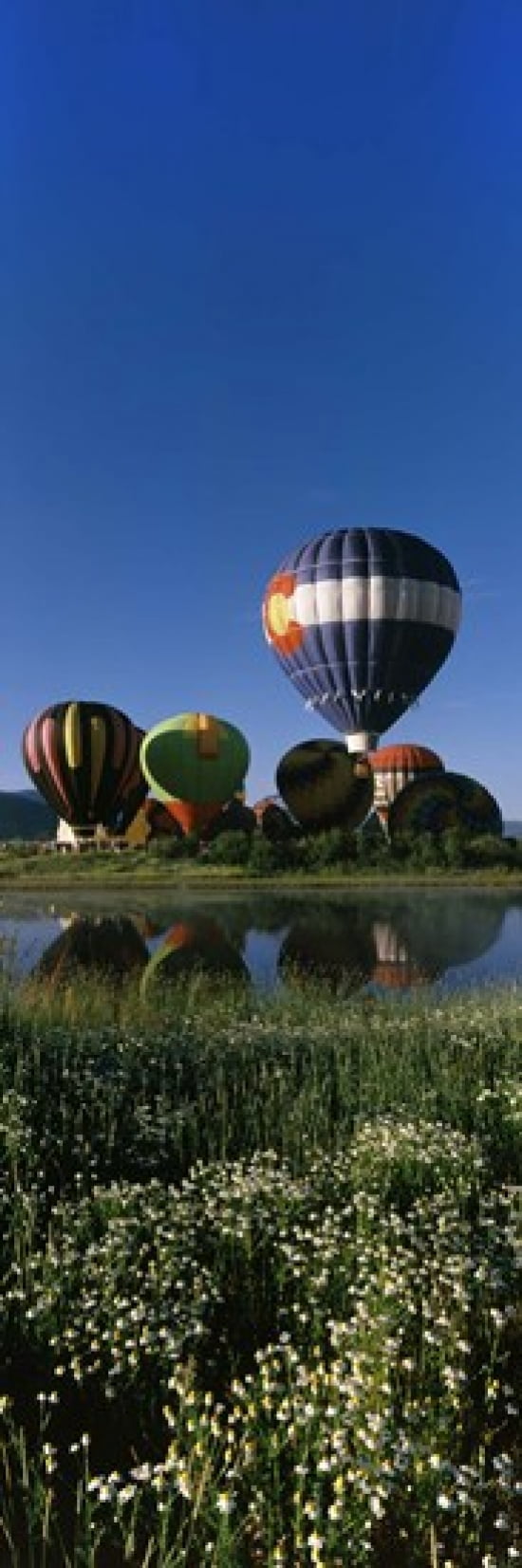 Reflection of hot air balloons in a lake Hot Air Balloon Rodeo Steamboat Springs Routt County Colorado USA Canvas Art - Panoramic Images (36 x 12)